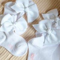 Socks with pure white bow